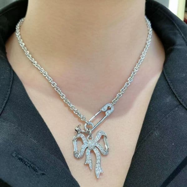 Designer Vivianes Weswood New Style Empress Dowager Diamondstudded Brooch Double Cross Necklace for Men and Women Light Luxury Niche Paperclip Collarbone