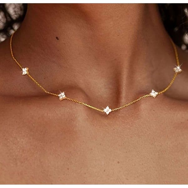 Four Leaf Clover Necklace Designer For Women Adorned with Tiny Sparkling Gems Elegant Stardust Design