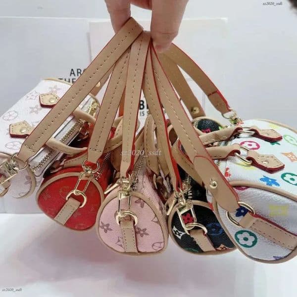 Luxury designer style mini creative fashion headphone bag, keychain bag, pendant, mini bag coin pocket, red packet flower shell