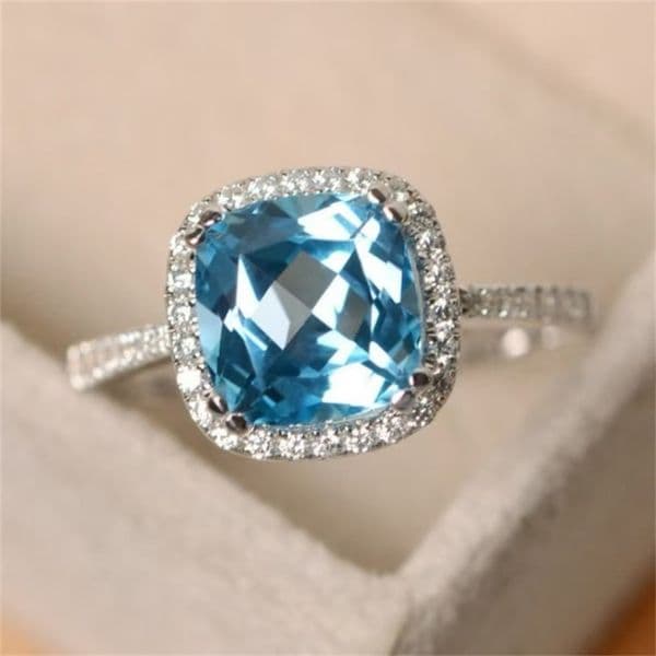 925 Sterling Silver Plated Light Blue and Clear Cubic Zirconia Cushion-Cut Halo Ring