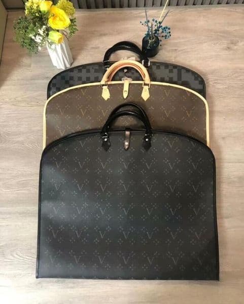 designer Coat Dust Cover clothing storage bag vintage leather material double zipper design multifunctional essential for business trips Dust Cover with hanger