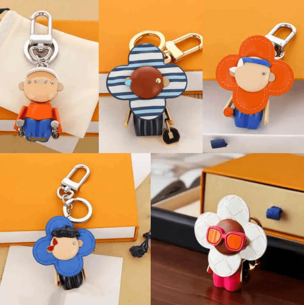 Newest Sunflower Keychain Fashion Cartoon Bag Charm High Quality Designer Keychain Luxury Bag Pendant For Men Women Accessories gift 18 Styles