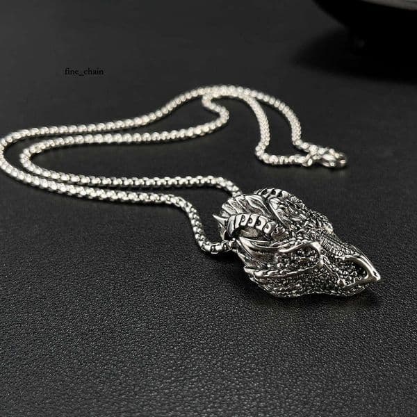 Europan and Amrican cross-bordr stainlss ncklac for mn prsonalizd rtro titanium stl dragon had pndant Hip Hop trndy nck accssory