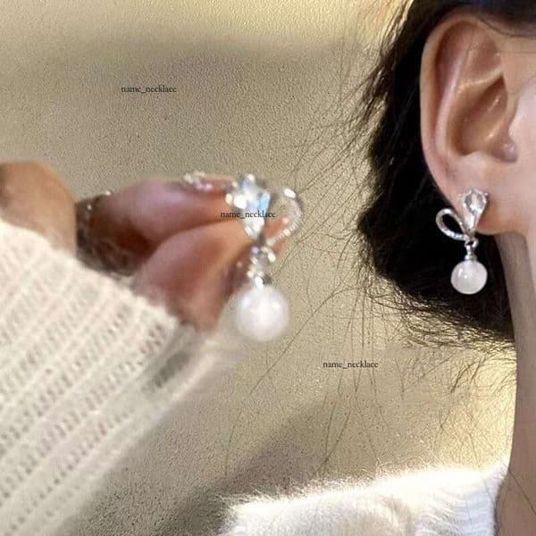 Unique design heart-shaped light luxury and feel, women's cat's eye stone drop earrings, 2025 new high-end earrings