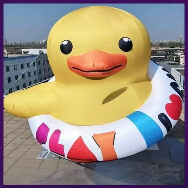 with blower Inflatable yellow duck swim ring for outdoor use - perfect beach party decoration
