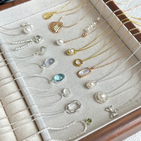 Designer luxury Ins Style Pearl Shell Summer Versatile Necklace for Women with Bowknot, Non-Fading Niche Design Clavicle Chain Jewelry