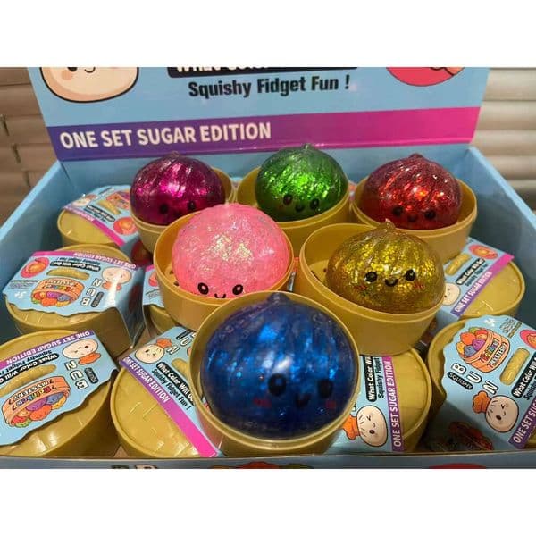 5.5CM Glitter Dumpling hape with Face Squishy Toy