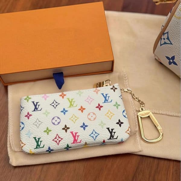 Designers luxurys Purses KEY POUCH POCHETTE CLES Women Mens Key Ring Credit Card Holder Coin Purses Mini Wallet Bag with box and dustbag M62650