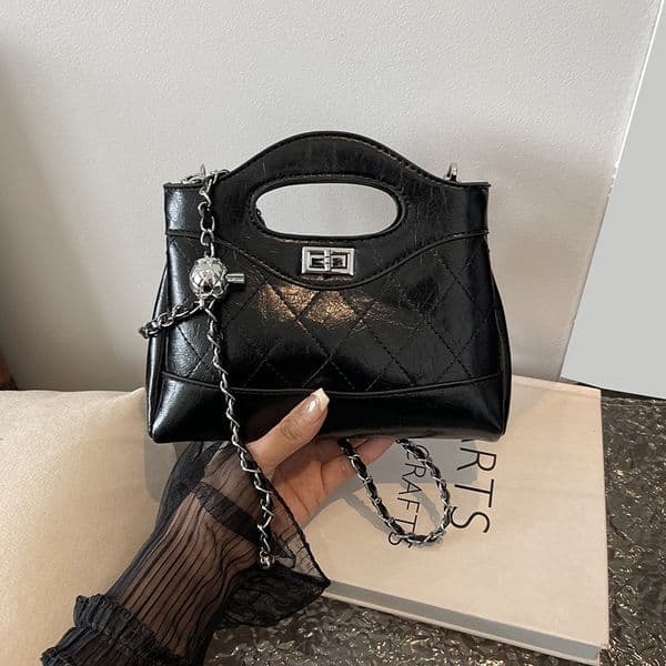 designer luxury 2026 New Lingge Small Fragrant Wind Chain Lock Small Golden Ball Niche Design Versatile Handheld Shoulder Bag Bold design