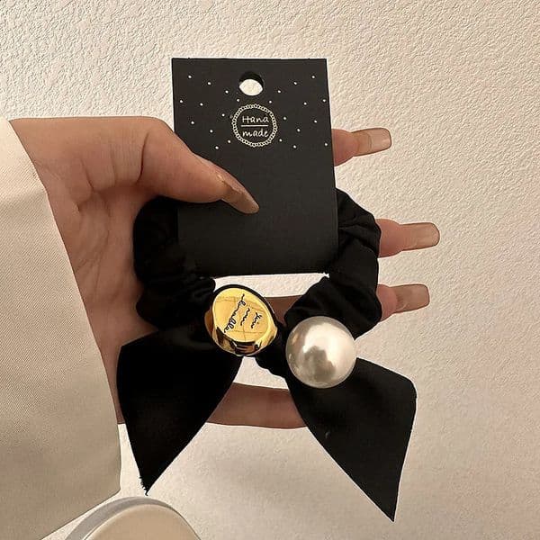Simple temperament highgrade sense pearl rubber band tie hair rope female black bow high elastic head rop 260509