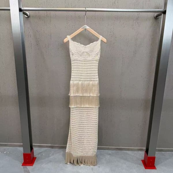 designer women's clothing 2026 European American ins-style cross-border fashion vacation dress with hollow-out design and tassel details