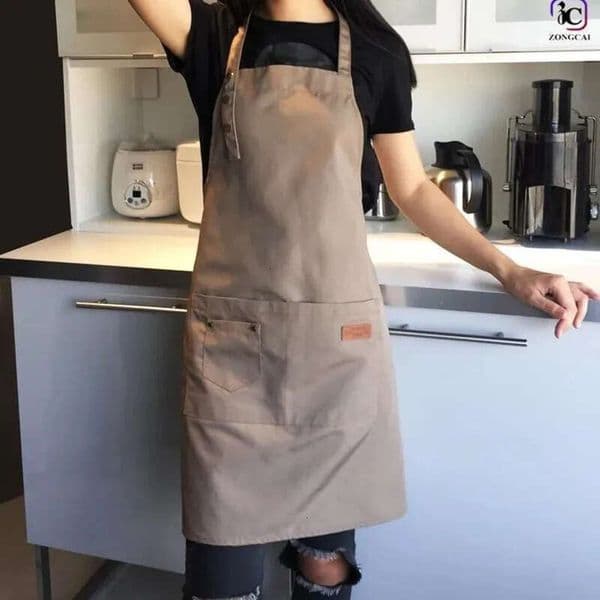2026 New Aprons 1 Pcs Waterproof Apron Woman's Solid Color Cooking Men Chef Waiter Cafe Shop Barbecue Barber Bib Kitchen Accessories 231026