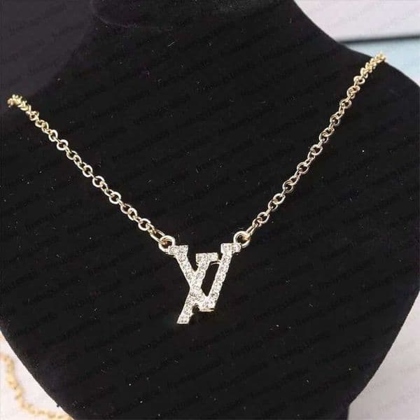 Sparkling Diamante Initial Necklace with Dainty Flower Charm for Fashionable Everyday Wear (Best Seller)