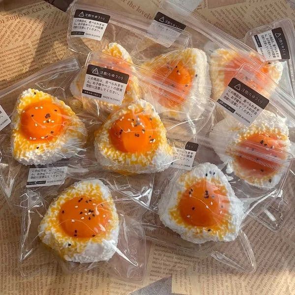 Rice ball pinch music slow rebound pinch decompression toy decompression artifact with blind box bag small toy Z260529