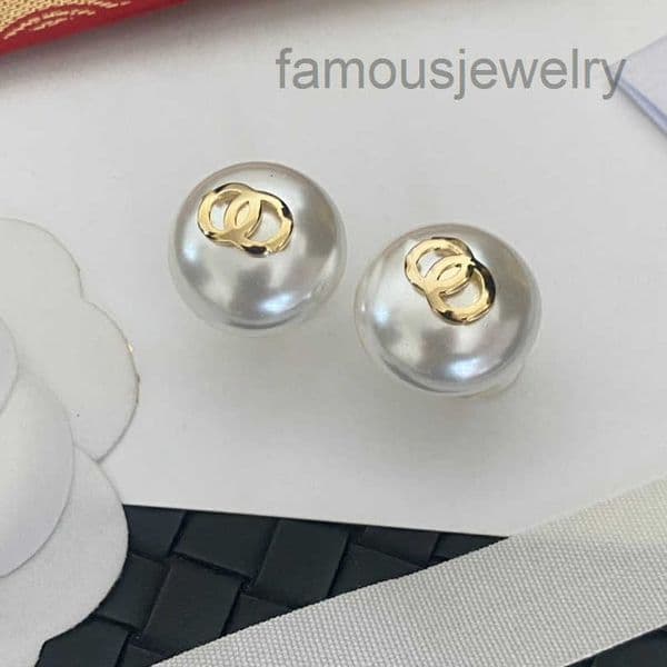 Gold Tone Pearl Stud Earrings With Interlocking Design Stylish Gift For Her Fashion Jewelry High Quality And Elegant Accessory