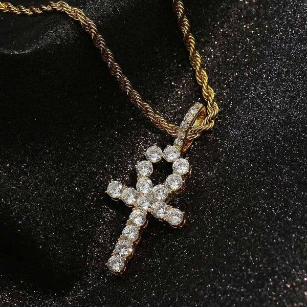 European and American hip-hop cross-shaped diamond pendant. Fashionable and unique accessory for trendsetters. Versatile necklace for both men and women.