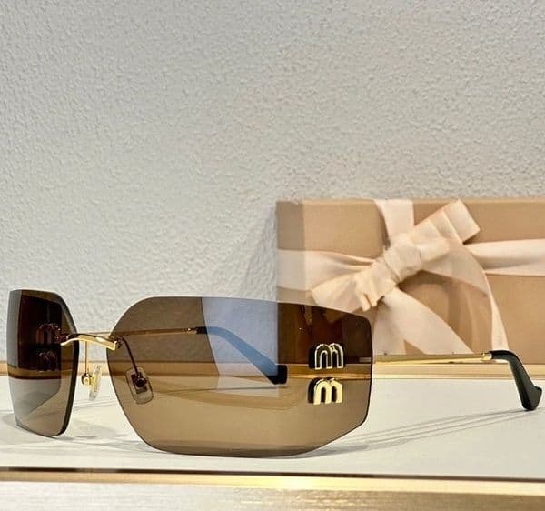 Designer Sunglasses Women Trend Frameless Curved Surface Lens Glasses Luxury sun glasses cat eye shades Y2K