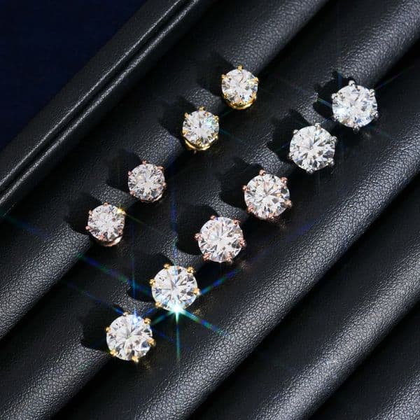Top-selling spike earrings with faceted round diamonds. Simple and fashionable jewelry. High-quality, timeless classic women's round earrings for parties. Gift.