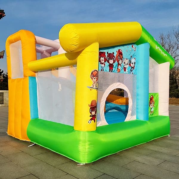 Indoor inflatable castle with small slides, children's trampoline, inflatable climbing slides, and play zones