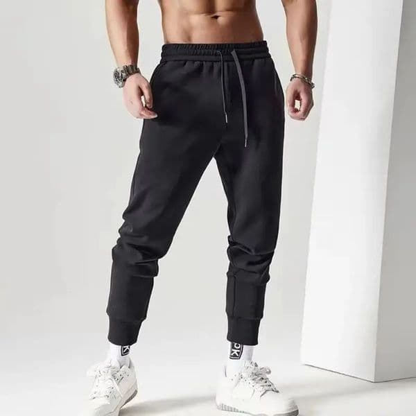 Mens Casual Sweatpants Sports Pants Unisex Fashion Solid Loose Trousers Streetwear Autumn Winter Jogging Fitness Pants 260416
