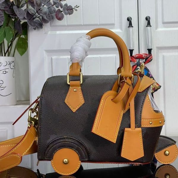 Designer Luxury Rolling Wheel Monogram Handbag Premium Vintage Leather Women Top Handle Crossbody Shoulder Bag Mini Travel Duffel Purse