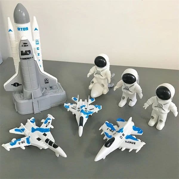 Boy space themed toy set capable of launching space rockets and spacecraft with 3 astronaut ornaments 260402BJ