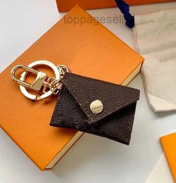 Designer bag charm Wallet Keychain Keyring Fashion Purse Pendant Car Chain Charm Brown Flower Mini Bag Trinket Gifts Accessories 2024