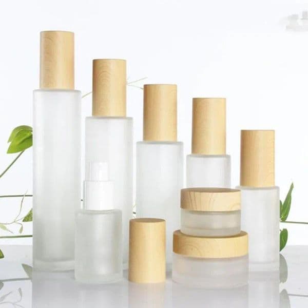 wholesale 30ml 40ml 60ml 80ml 100ml Frosted Glass Vial Cosmetic Jar Bottle Face Cream Container Lotion Spray Pump Bottles with Plastic Imitation Bamboo Lids