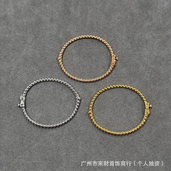 designer bracelet vanness cleef Beaded bracelet with a rolling bead design is perfect for layering and looks stylish