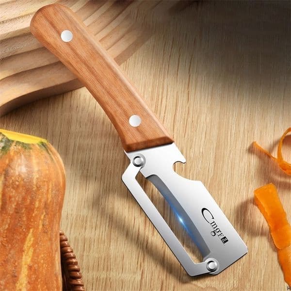 Stainless steel peeler with wooden handle for peeling and slicing fruits and vegetables Durable and smooth 260428