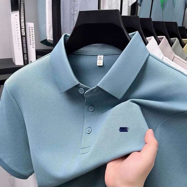 Tommmy Mens Designer Clothes Hilfighers Graphic Tshirt POLO Shirt Mens Short-sleeve Summer Cool Feel Business Casual High-end Pure Cotton T-shirt For Kids