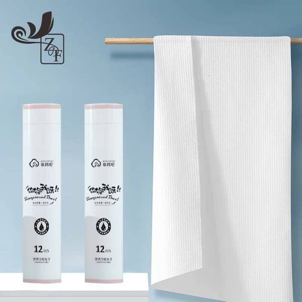 Disposable compressed towel sheets in the shape of large