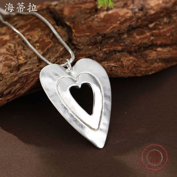 sand silver Best-selling bright silver bright gold contrasting hollow heart-shaped long pendant womens high-end heart-shaped long necklace L260603R1PD