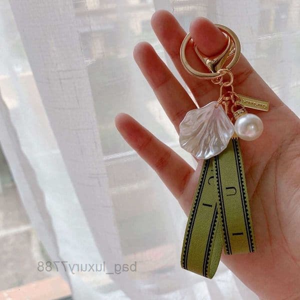 key keychain chain bag charm female car key ring Pearl charm green ribbon delicate shells keychain couple pendant gift nice S260608
