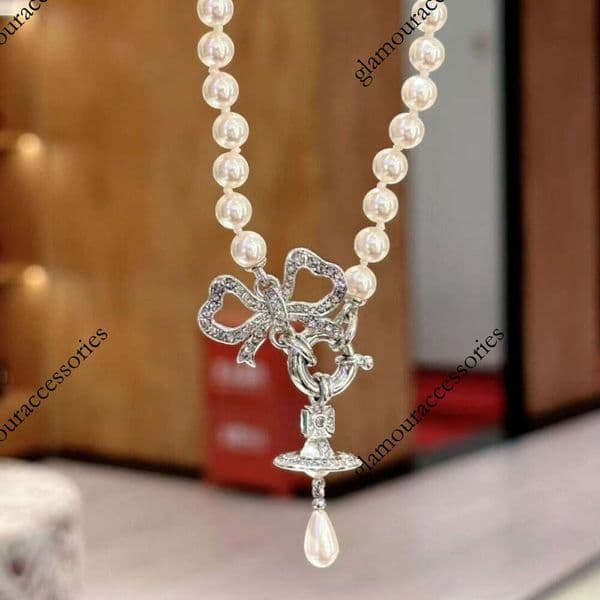 Designer jewelry Vivi ennewestwood bracelet Summer new style Empress of the West bowknot water drop pearl necklace for women orb planet pendant collarbone chain