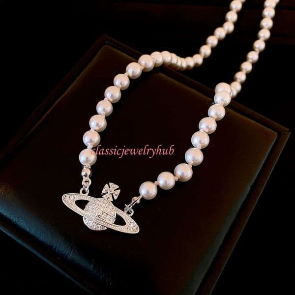 vivienns west wood jewelry necklace Saturn pearl necklace with unique pendant design minimalist celebrity sweater chain