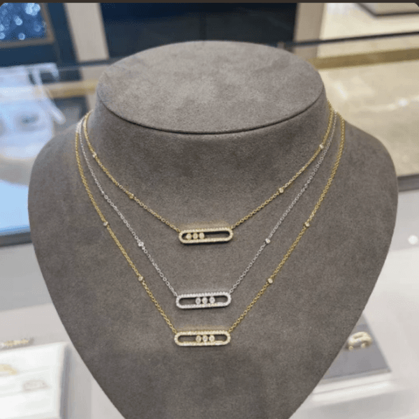 High version necklace three diamond trumpet sliding full diamond necklace niche all-in-one high sense geometric designer pendant jewelry women2026