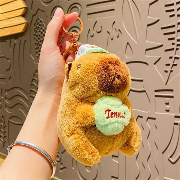 Game And Toy Game And Toy New stuff animal Cartoon Capybara Sports Tennis Baseball Plush Bag Pendant Stuff Animal Cute Capilla Keychain Doll Decoration Car Pe