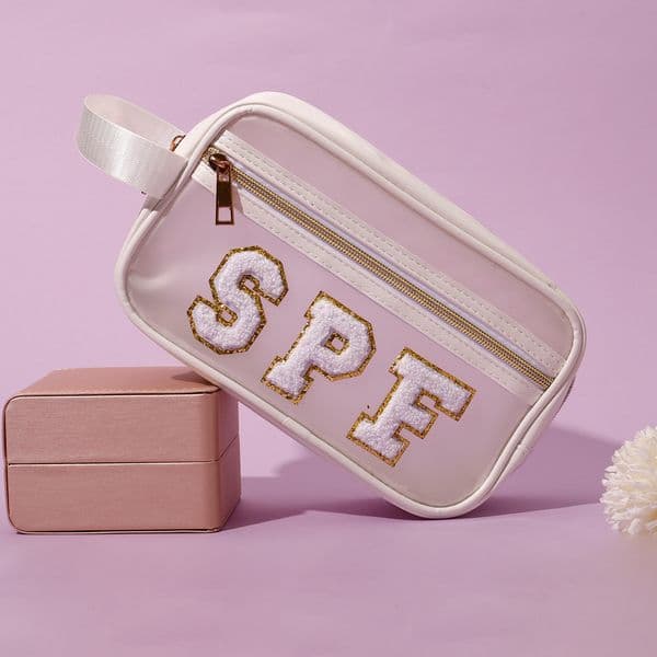 1pc Travel Cosmetic Bag & Organizer With Sunscreen For Women, Multilayered Alphabet Large Capacity Makeup Bag, PVC Waterproof Portable Bag CXD2409106