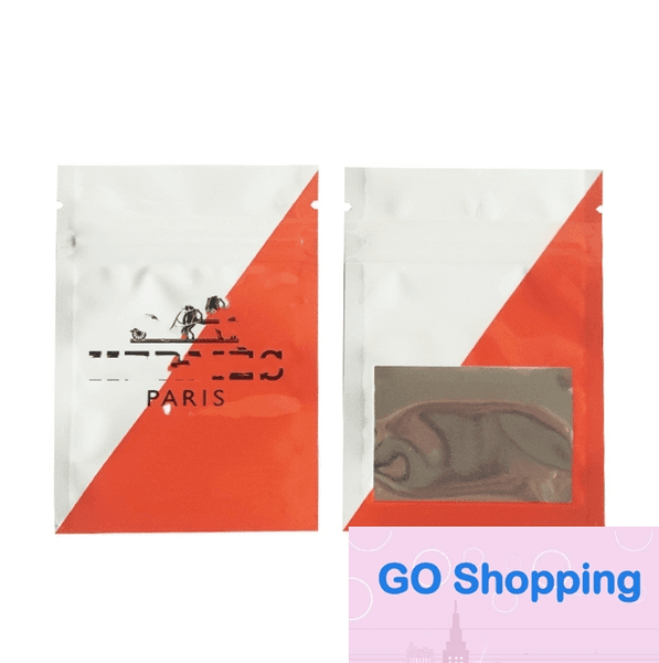 Wholesale 100 Pieces Price Spot 1G Cartoon Laser Candy Bag Cross-Border Foreign Trade Packing Bags 6x14cm/7x10cm