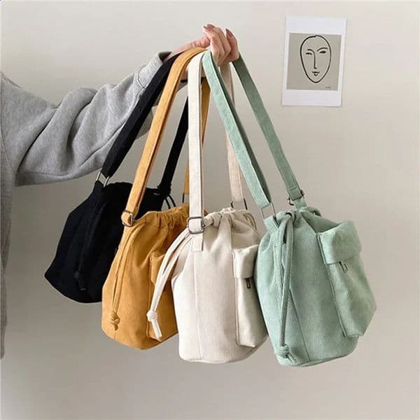 Casual vintage shoulder bag female crossbody solid color small bag with drawstring mouth bucket bag 240829