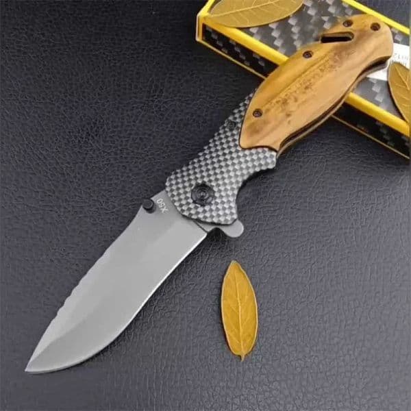 High Quality Gray X50 Pocket Folding Knife 5Cr13Mov Titanium Blade Wood Handle Hunting folding knife Survival Tactical Knife EDC Cutting Tools 3300 15535 535 94