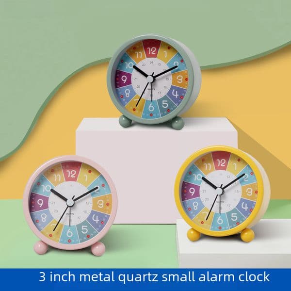 Children's early education metal small alarm clock students learn mute desktop clock cartoon luminous quartz clock wholesale