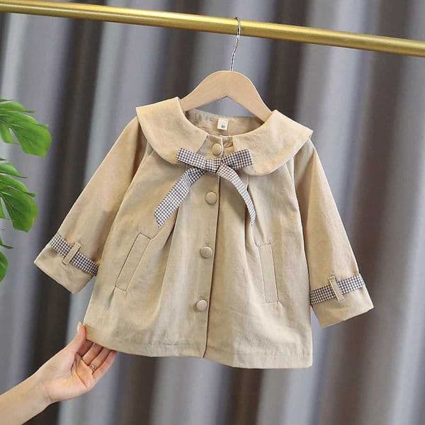 Baby girl spring and autumn bow solid windproof childrens clothing long ditch Korean cute childrens jacket girl casual jacketW240726