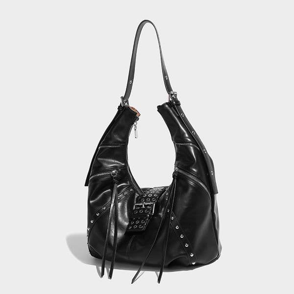 Niche spicy girl oil wax leather commuting handbag autumn and winter new fashion millennium style rivet shoulder croissant