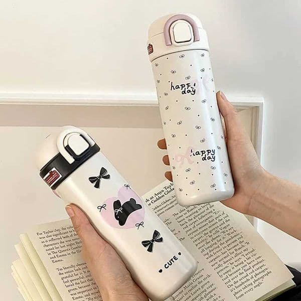 New Arrival Black and pink hot water bottle coffee cup stainless steel drum bow structure Korean travel insulation sheet hot water bottle 500ml M241022