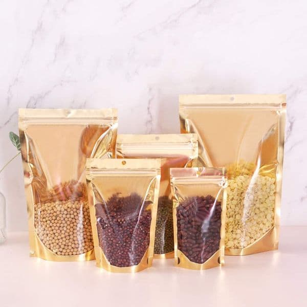 Wholesale Gold Aluminum Foil Packaging Bags Mylar Smell Proof Stand Up Hanging Hole Pouch For Dog Food Cookies Cotton Sugar Snack Coffee Bean Tea Kernel Dried B2