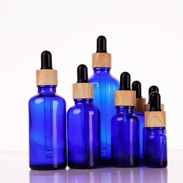 Wholesale Blue Glass Essential Oil Serum Perfume Bottles With Eye Dropper Wood Grain Cap For Liquid Cosmetic 5Ml 10Ml 30Ml 50Ml 100Ml 0000
