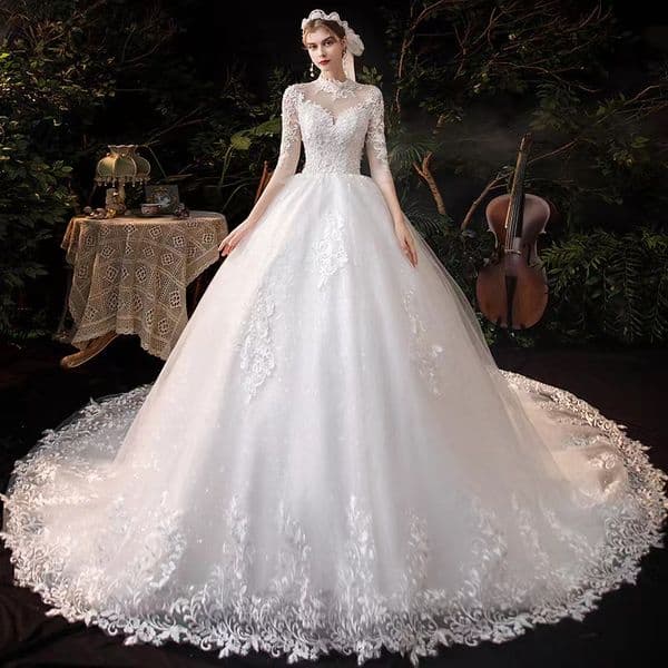 African Dubai Elegant Long Sleeves A-Line Wedding Dresses Sheer Crew Neck Lace Appliques Beaded Vestios De Novia Bridal Gowns with Buttons Plus Size wed dress