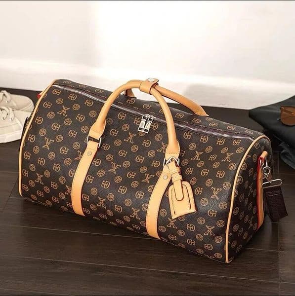 Top Quality New Men Duffle Bag Women Travel Bags Hand Luggage Travel Bags Men Pu Leather Handbags Large CrossBody Bags Totes Purse Bag 55cm